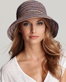 Helen Kaminski's crocheted raffia hat is accented with a hand rolled raffia string tie that can be used for size adjustment. Inner neoprene band secures the fit. This rollable and packable hat is full of style.