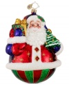 Have a holly jolly Christmas with this lovely, hand-painted ornament from Christopher Radko, featuring St. Nick or a cheerful snowman holding a gift and Christmas tree, both classic symbols of the season. Finished with a dusting of glitter for an extra spark.