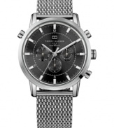 An industrial-inspired mesh bracelet adds toughness to this Tommy Hilfiger watch.