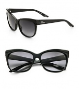 Retro-inspired cat's-eye design in lightweight acetate. Available in black with grey gradient lens.Plastic logo temples100% UV protectionMade in Italy
