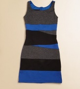 Elegant yet trendy, this slim knit silhouette has asymmetrical details and a pop of color.ScoopneckSleevelessBack zipper70% polyester/22% rayon/8% spandexHand wash coldMade in the USA