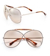 A unique style with a sleek acetate covered bridge. Available in shiny rose gold/grey acetate with grey gradient lens or shiny rose gold/havana acetate with blush gradient lens. Metal frame with acetate details100% UV protectionMade in Italy 
