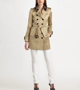 A classic style, finished with traditional details and a removable knit collar lining.Foldover collar with removable liningDouble-breasted button frontButton-down gunflapSelf beltSide slash button pocketsBelted cuffsButton-down rainflapBack ventAbout 35 from shoulder to hem96% cotton/4% elastaneDry cleanImportedModel shown is 5'10 (177cm) wearing US size Small. 