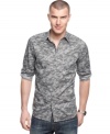 An all over snake print on this shirt from Kenneth Cole New York adds some safari style to your casual look.