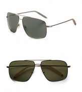 Oversized aviators with double-bridge detail and injected silicone temple tips. Available in gold frames with mineral glass green lenses and chrome frames with mineral glass grey lenses. Metal frames 100% UV protective Imported 