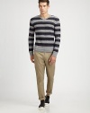 A modernized version of the favorite striped sweater, crafted with a fine-gauge softness by the label defining contemporary knitwear. V-neck84% merino wool/8% baby camel/8% nylonDry cleanImported