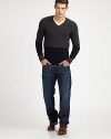 Two textures, two colors, one perfect sweater: a ribbed top portion is stitched to a fine-knit bottom half for a new spin on the colorblocked look in superior merino wool. V-neck Merino wool Dry clean Imported Additional Information Men's Shirts & Sweaters Size Guide 