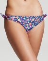 A neon floral print lends bright beach-ready style to these swim briefs from Shoshanna.