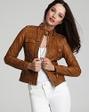 Get ahead of the sartorial curve in this structured MICHAEL Michael Kors leather jacket, accented with bullish gold hardware for downtown edge. Showcase the style against crisp white separates.