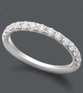 A sparkling wedding band provides the perfect complement. Crafted in 14k white gold, ring features pave-set, round-cut diamonds (1/2 ct. t.w.).