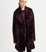 An uptown-inspired classic in lush dyed fur with cozy wool sleeves.Notch collarLong sleevesOpen frontAbout 34 from shoulder to hemFront: dyed rabbit furSleeves and back: 70% acrylic/30% woolDry cleanImportedFur origin: ChinaModel shown is 5'9½ (176cm) wearing US size Small. 