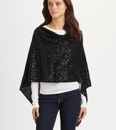 Add a dash of sparkle with this fully sequined design. Cotton Handkerchief hem About 16½ from shoulder to hem Hand wash Imported 