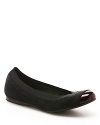 Stuart Weitzman dances into the cap toe trend in these versatile, updated ballet flats.