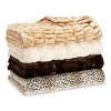 Soft and luxurious, Hudson Park's faux fur throws are a glamorous accent fit for any décor.
