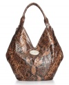 Breakaway from the ordinary with this fierce XOXO snakeskin print tote ready to dominate the concrete jungle.  An easily accessible shape and side zipper expanders make this the perfect bag for the girl who doesn't travel light.