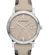 Neutral chic mixed with check patterns: a stylish and precise Burberry timepiece.