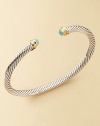 From The Cable Kids Collection. A charming sterling silver cable with turquoise end caps set in 18k gold. Turquoise Sterling silver and 18k yellow gold Cable, 4mm Diameter, about 2 Made in USA