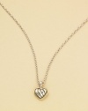 From the Cable Kids Collection. A sweet and simple heart of cabled sterling silver, framed in 18k gold on a sterling silver chain. Sterling silver and 18k yellow gold Chain length, about 14 Pendant length, about ¼ Lobster clasp Made in USA