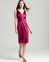 A seriously sophisticated take on evening chic, this Elie Tahari dress is rendered in sleek silk charmeuse for an elegant finish. Intricate pleating at the waist creates an ultra-flattering silhouette.