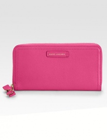 Lustrous leather in a sleek zip-around silhouette, finished with a demure bow zipper-pull.Zip-around closureCenter zip compartmentTwelve credit card slotsTwo bill compartmentsCotton/leather lining7½W X 4H X 3/4DMade in Italy Lustrous leather in a sleek zip-around silhouette, finished with a demure bow zipper-pull.Zip-around closureCenter zip compartmentTwelve credit card slotsTwo bill compartmentsCotton/leather lining7½W X 4H X 3/4DMade in Italy