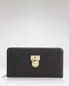 The Hamilton wallet captures the cosmopolitan essence of MICHAEL Michael Kors with its padlock design and sophisticated leather.