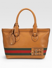 Leather tote with signature web detail and light goldtone hardware.Double top handles, 6¾ drop Zip-top closure Detachable identification tag with embossed vintage Gucci trademark Inside zip, cell phone and PDA pockets Fully lined 17¾W X 10¼H X 6D Made in Italy