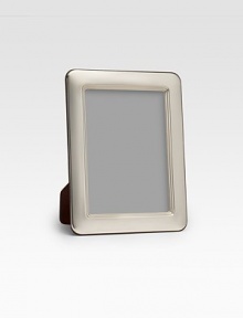 A picture-perfect tabletop design from Barcelona's famed silversmiths, crafted with heirloom detail and rounded corners in gleaming sterling silver. Accommodates a 4 X 6 photograph Made in Spain A picture-perfect tabletop design from Barcelona's famed silversmiths, crafted with heirloom detail and rounded corners in gleaming sterling silver. Accommodates a 4 X 6 photograph Made in Spain