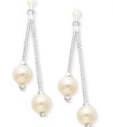 Two lovely acrylic pearls (7mm) are suspended from linear wires on these darling earrings from Charter Club. Crafted in silver tone mixed metal. Approximate drop: 1-3/4 inches.