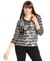 Snag a standout casual look with Style&co.'s three-quarter-sleeve plus size top, showcasing an embellished print.