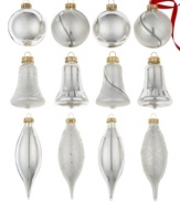 A very merry tree will take shape with silver glass ornaments from Martha Stewart Collection. Ball, bell and drop shapes tinged with radiant silver glitter fill out its branches with timeless grace.