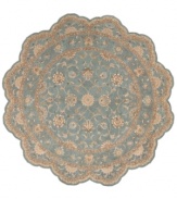 Bring new distinction to your home. Marked by its delicate aqua color palette and luxuriously soft texture, this handcrafted rug recreates the elegance of 17th Century Persian carpets. Hard-twist yarns are specially dyed for a subtlety of coloration producing a vintage look similar to traditional vegetable dyes.