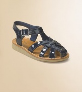 A feminine take on a classic fisherman design, with graceful straps of shiny faux leather and an open, airy feel.Faux leather interwoven strap upperBuckle ankle strapFaux leather footbedMini wedge composite rubber soleImported