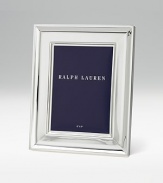 Poised and polished silverplate surrounds your photos in quiet elegance. Black fabric backing Anti-tarnish finish Silver-plated RL closure Signature gift box Imported
