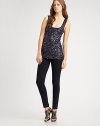 Luxe glittering sequins lend an ethereal touch to this easy tank silhouette.Scoopneck Sleeveless Pullover style About 29½ from shoulder to hem Self: 94% rayon/6% spandex; trim: viscose Dry clean Made in USA of imported fabric