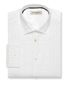 A man can never have too many white shirts--this timeless Burberry variety offers up crisp, white cotton and a tailored, slim fit. A man can never have too many white shirts--this timeless Burberry variety offers up crisp, white cotton and a tailored, slim fit.