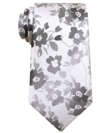 With a fresh floral pattern, this tie from John Ashford will easily grow on you.
