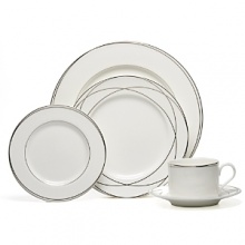 Vows creamer by Lauren by Ralph Lauren Home. Inspired by graceful curves of wedding rings, this elegant dinnerware line features interconnected platinum bands on the finest bone china. Makes a stunning table for any special occasion. Vows creamer by Lauren by Ralph Lauren Home. Inspired by graceful curves of wedding rings, this elegant dinnerware line features interconnected platinum bands on the finest bone china. Makes a stunning table for any special occasion.