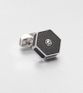 This is an urban and industrial design employing the hexagon shape and adding signature Tateossian texture with translucent and opaque enamel detailing. There is one round crystal from the SWAROVSKI ELEMENTS range set into the enamel surface to add a flash of light.Sold separatelyRhodium platedEnamel trimMade in United Kingdom