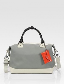 Roomy, structured and sporty carryall crafted from laminated canvas with rich leather trim.Double top handles, 5 dropRemovable shoulder strap, 20 dropTop-zip closurePatent leather key-chain pouchOne inside zip pocketThree inside open pocketsCotton lining12½W X 8H X 7DImported Roomy, structured and sporty carryall crafted from laminated canvas with rich leather trim.Double top handles, 5 dropRemovable shoulder strap, 20 dropTop-zip closurePatent leather key-chain pouchOne inside zip pocketThree inside open pocketsCotton lining12½W X 8H X 7DImported