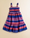 This perky frock's awe-inspiring look is completed with sweet bows, a gathered bodice, full skirt and ruffled hem.SquareneckThin straps with bow detailPullover styleGathered bodiceElastic waistbandFull skirtRuffled hemCottonHand washImported