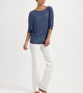 Lightweight Italian jersey meets an elongating silhouette for a flawless look. ScoopneckElbow-length sleevesPull-on styleAbout 30 from shoulder to hemViscoseHand washImported of Italian fabric