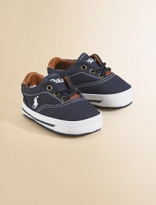 A classic pair of canvas sneakers for your little one with leather trim and padded insole.Lace-up closureCanvas upperCotton liningCanvas solePadded insoleImported A classic pair of canvas sneakers for your little one with leather trim and padded insole.Lace-up closureCanvas upperCotton liningCanvas solePadded insoleImported