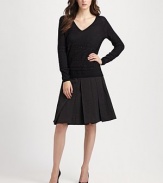 Beautiful beading lends an elegant look to this simply stylish knit.Pull-on styleLong sleevesMerino woolDry cleanImported of Italian fabric Model shown is 5'10½ (179 cm) wearing US size Small. 