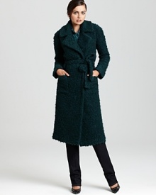 With a tactile texture and tailored silhouette, this Tory Burch coat strikes at a distance. Slip it on for instant chic.