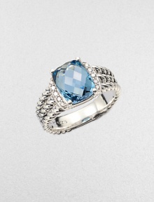 From the Petite Wheaton Collection. A stunning, faceted blue topaz stone flanked by brilliant diamonds on a sterling silver, triple-row shank. Blue topazDiamonds, .1 tcwSterling silverImported From the Petite Wheaton Collection. A stunning, faceted blue topaz stone flanked by brilliant diamonds on a sterling silver, triple-row shank. Blue topazDiamonds, .1 tcwSterling silverImported