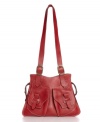 Add some vintage-flair to your handbag collection with this gorgeous Patricia Nash bag featuring handcrafted goldtone hardware and a unique burned edge finish.