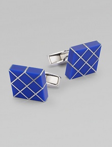 Elegant links with gleaming rhodium plating with inlaid lapis.Rhodium-plated sterling silverLapisAbout ½ diam.Made in the United Kingdom Elegant links with gleaming rhodium plating with inlaid lapis.Rhodium-plated sterling silverLapisAbout ½ diam.Made in the United Kingdom