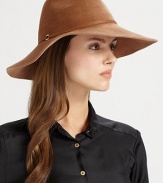 Asymmetric wide brim hat with leather and metallic O'Ring trim.Adjustable inner band One size fits most Brim, about 4 Rabbit hair Imported Please note: Sold with brush to maintain pile. 