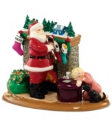 A sleepy little girl will meet Santa only in her dreams in this precious figurine from Department 56. Cookies and milk on the ottoman and a tiny Christmas village on the mantel complete the jolly holiday scene.