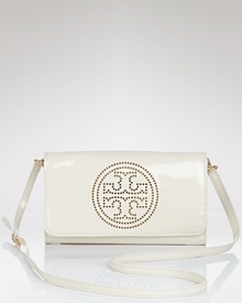 Polish off your look with this glossy, perforated leather clutch from Tory Burch. In a day-to-night-right size, it features a look-defining emblem and removable shoulder strap. Polish off your look with this glossy, perforated leather clutch from Tory Burch. In a day-to-night-right size, it features a look-defining emblem and removable shoulder strap.